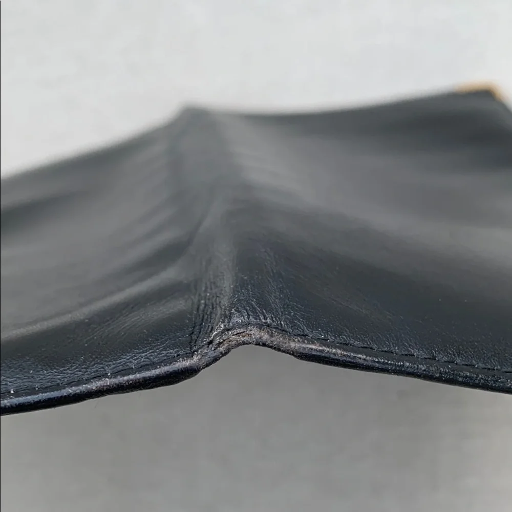 Dunhill Elegant Black Wallet with Gold Accents